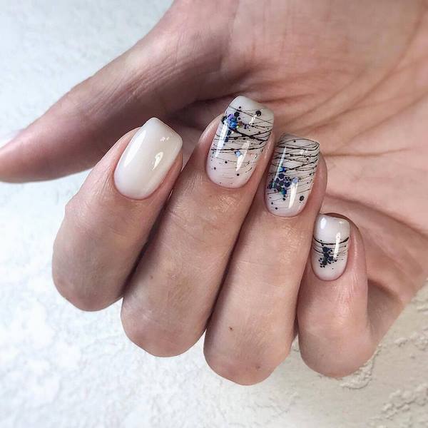 Нежнейший светлый маникюр 2026: новые идеи на фото